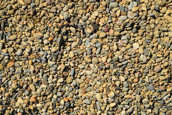 Küçük yuvarlak ezilmiş taş kökenli