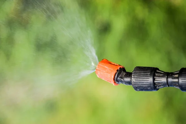 stock image Spraying herbicide from the nozzle of the sprayer manual