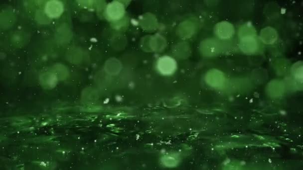 Inverno Verde Motion luci di sfondo, neve che cade sul ghiaccio sfocato ciclo bokeh — Video Stock