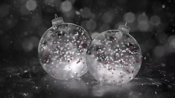 Dos bolas de hielo blanco de Navidad giratorio bolas de nieve rojo fondo lazo — Vídeo de stock