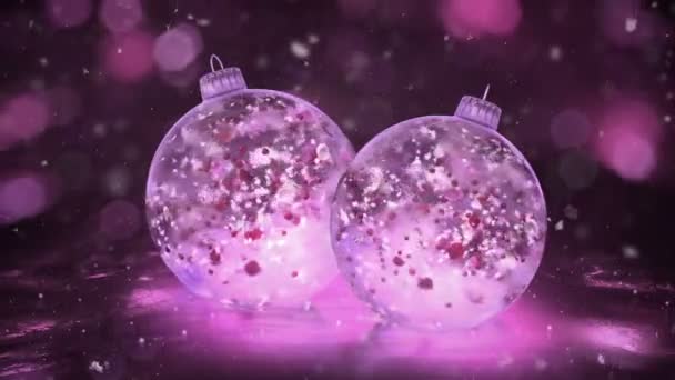 Due Rotante Natale Rosa Ice Baubles neve colorato petali sfondo loop — Video Stock