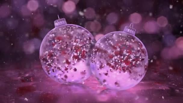 Dois girando Natal Rosa Ice Glass Baubles neve pétalas vermelhas loop de fundo — Vídeo de Stock