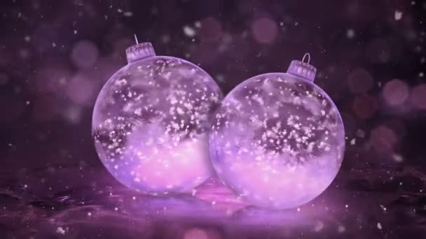 İki dönen Noel pembe buz cam Baubles süslemeleri arka plan döngü kar — Stok video