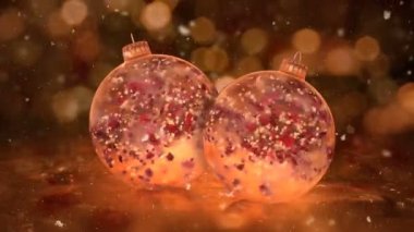İki dönen Noel altın buz cam Baubles kırmızı yaprakları arka plan döngü kar