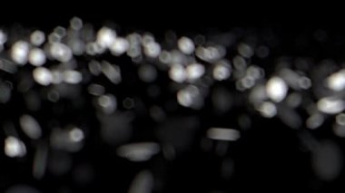Soyut Noel arka plan bulanık defocused bokeh ışıkları ile yüksek kaliteli animasyon gümüş. Sorunsuz döngü