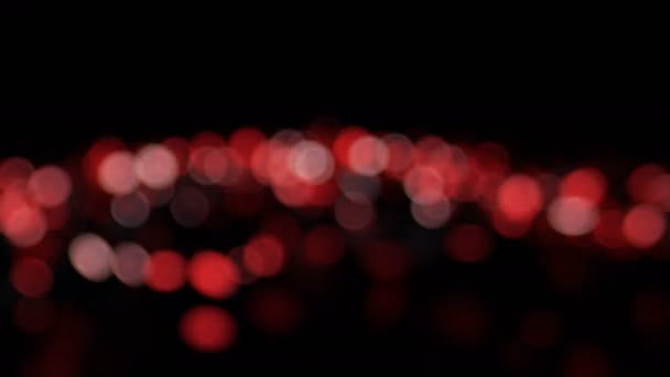 Rote Animation von unscharfem abstrakten Weihnachtshintergrund mit Bokeh defokussierten Lichtern. nahtlose Schleife — Stockvideo