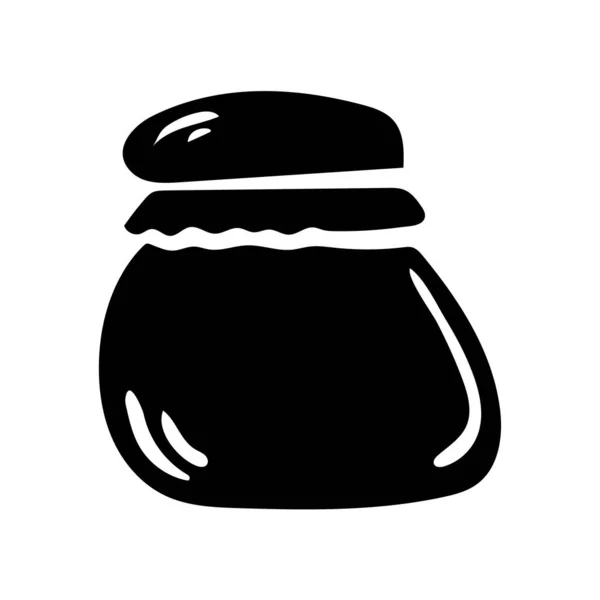 Basit bir şekilde izole edilmiş siyah cam reçel kavanozu.