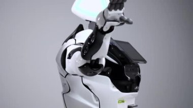 Modern Robotik teknolojiler. Beyaz modern robot parlak bir stüdyoda. Bir tebrik el sallayarak android görüntüleyiciyi selamlıyor. Beyaz zemin üzerinde bir robot gösteri. Burada gelecek