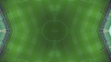 Yaratıcı kaleydoskop drone ile çerçeveden. Geceleri boş futbol sahası