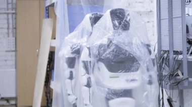 Fabrika Robotlar, modern robot gelişmeler üretimi için. Birkaç robotlar stok plastik wrap bulunmaktadır..