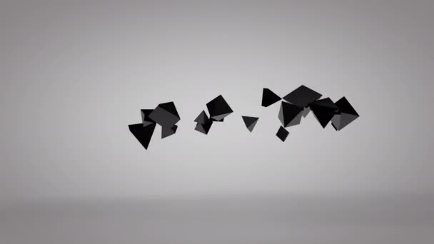 Абстрактна 3D-анімація чорних пірамід динамічно пульсує. У білій студії — стокове відео