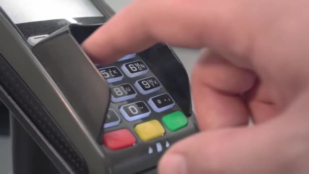 Pos terminal payment in cafe. Man hand enter pin code on payment terminal. Banking services of electronic money. Credit card machine for money transaction. Closeup of male hand using bank terminal. — Stock Video