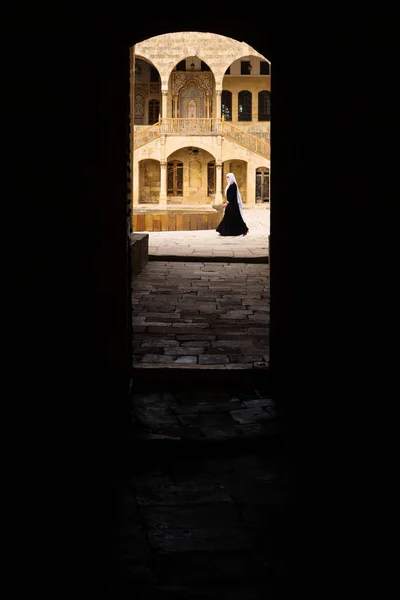 Vertical view trough entrance tunnel with lady passing by at Emir Bachir Chahabi Palace Beit ed-Dine in mount Lebanon Middle east, Lebanon — Stock Photo, Image