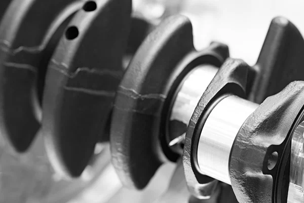 Engine crankshaft close-up industrial engineering service automobile concept.