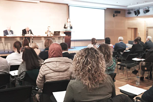 Business woman and people Listening on The Conference. Horizontal Image