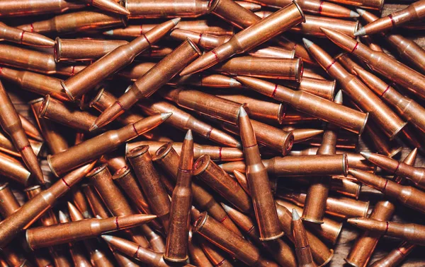 close-up of metal bullets in heap