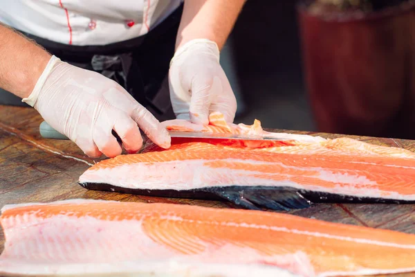 Hands Chef Cutting Raw Salmon Fillet Table — Stock Photo, Image