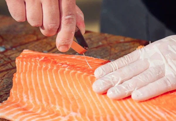 Hands Chef Cutting Raw Salmon Fillet Table — Stock Photo, Image