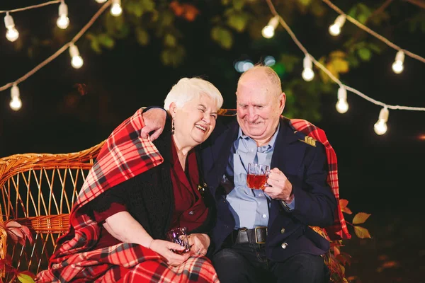 Happy Senior Couple Drinking Tea Evening Sitting Couch — Stock Photo, Image