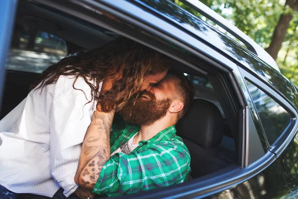 Couple make love in the car.