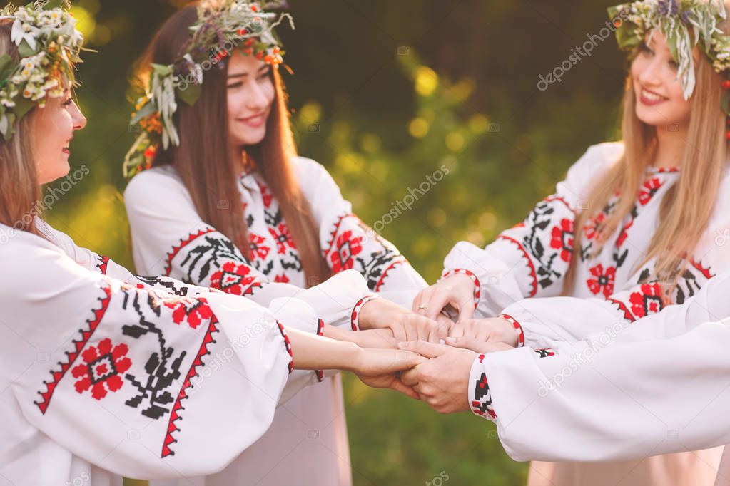 Midsummer. A group of young people of Slavic appearance at the celebration of Midsummer.