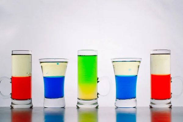 Shots on bar. colorful cocktails on bar counter — Stock Photo, Image