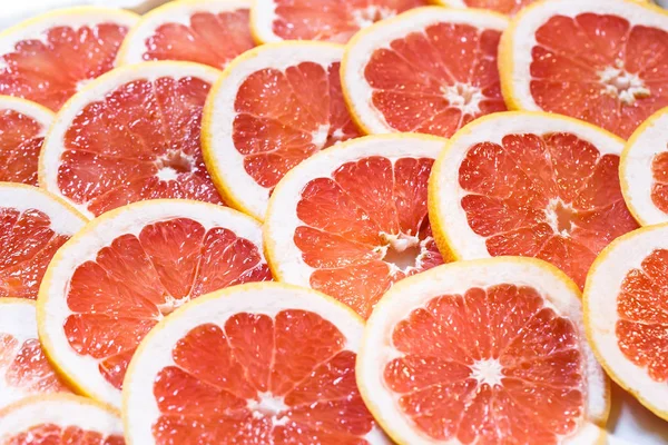 Primer plano del pomelo en rodajas como fondo —  Fotos de Stock