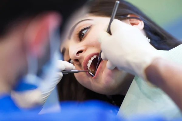 The patient at the dentist. Dental clinic. — Stock Photo, Image