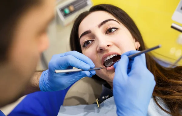The patient at the dentist. Dental clinic. — Stock Photo, Image