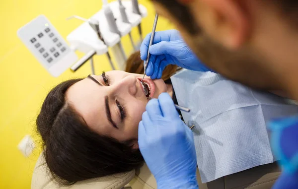 The patient at the dentist. Dental clinic. — Stock Photo, Image