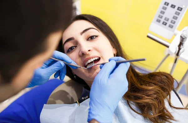 The patient at the dentist. Dental clinic. — Stock Photo, Image