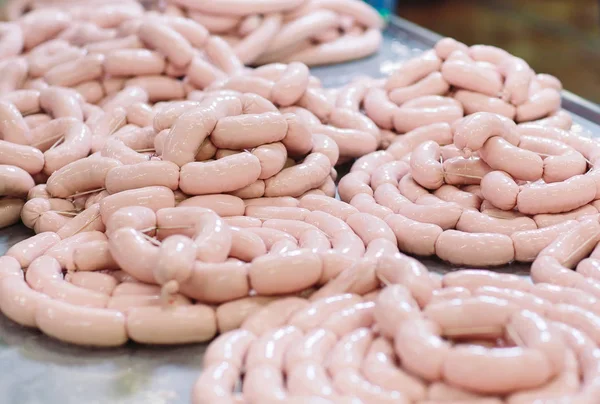 Making sausages, food production in the factory. — Stock Photo, Image