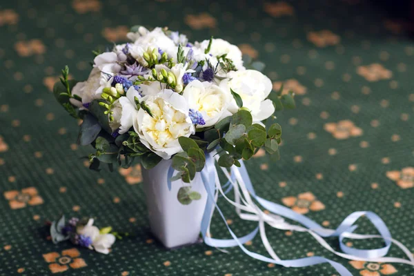 Wedding bouquet as a symbol of tenderness and beauty of the bride