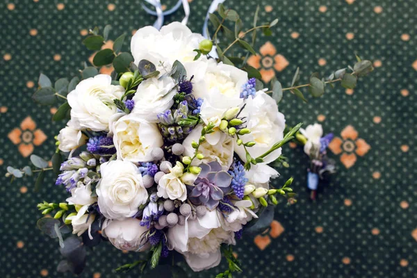 Wedding bouquet as a symbol of tenderness and beauty of the bride
