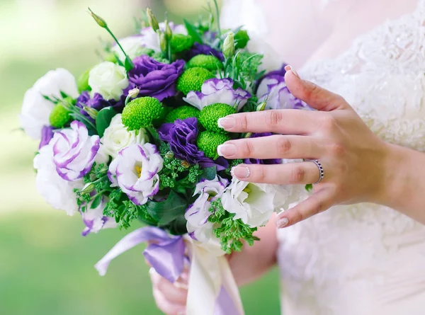 Wedding bouquet as a symbol of tenderness and beauty of the bride