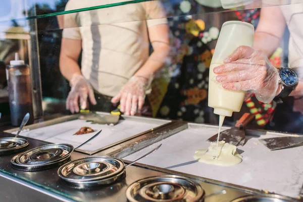 stir-fried ice cream rolls at freeze pan. Organic, natural rolled ice cream, hand made dessert