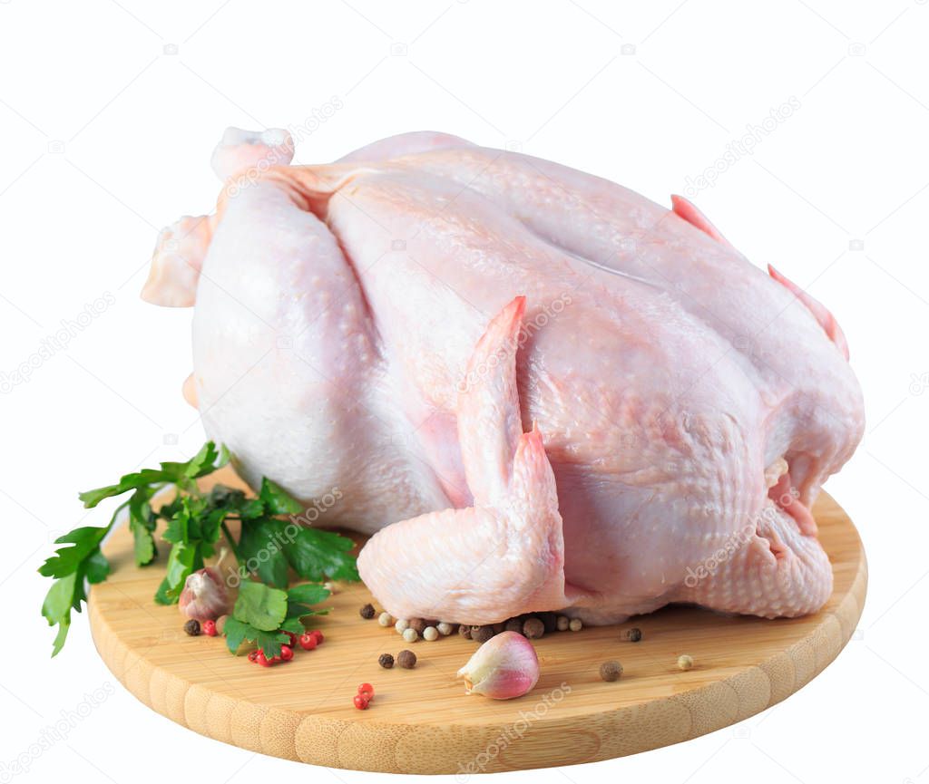 raw chicken carcass on the cutting board isolated on white background.