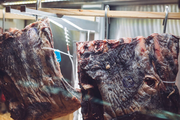 Dried meat. Beef steak in the drying oven.