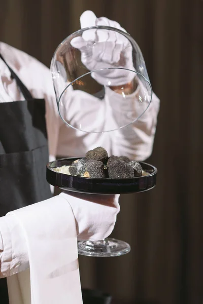 restaurant chef delicacy. truffle vegan food mushroom. waiter service meal concept