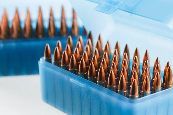 Hunting cartridges in a plastic box. Bullet storage box. — Stock Photo, Image