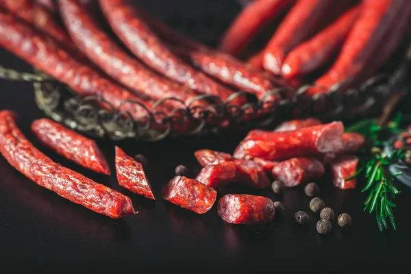 Hunting Sausages sausages On a dark background. — Stock Photo, Image
