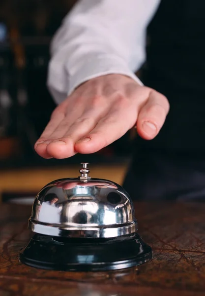 Restaurant bell vintage with hand. Hotel service bell — Stock Photo, Image