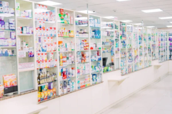 Banco negozio tavolo farmacia sfondo scaffale offuscata sfocatura fuoco farmacia farmacia farmaco medicina vuota farmaceutica. — Foto Stock