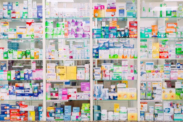 counter store table pharmacy background shelf blurred blur focus drug medical shop drugstore medication blank medicine pharmaceutics.