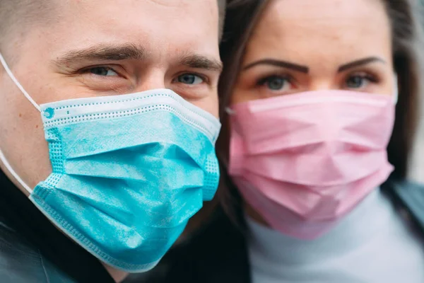 Portrait of a Couple of European appearance with medical masks. — Stock Photo, Image