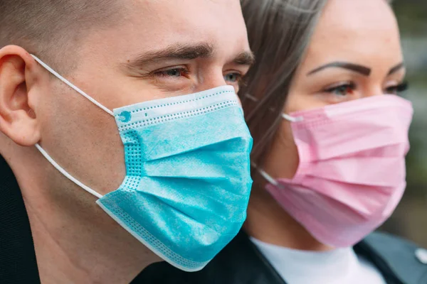 Portrait of a Couple of European appearance with medical masks. — Stock Photo, Image