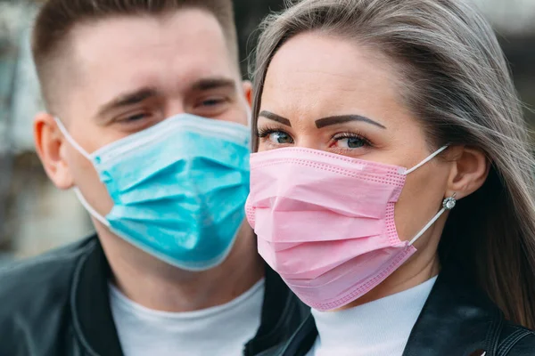 Portrait of a Couple of European appearance with medical masks. — Stock Photo, Image