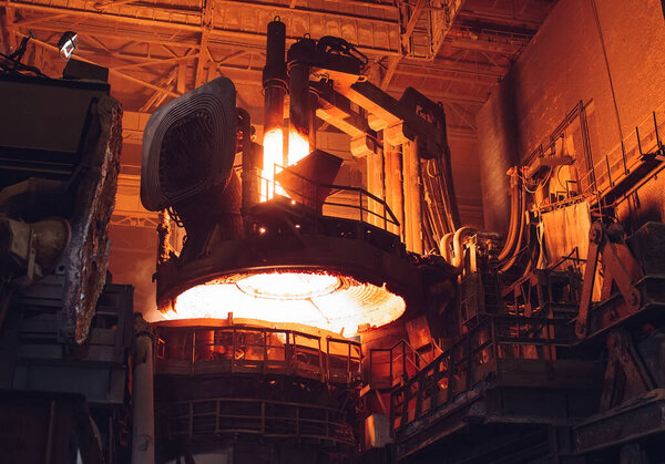 Melting of metal in a steel plant. High temperature in the melting furnace