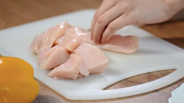 Female Chef Cuts Raw Chicken Meat Cutting Board — Stock Video