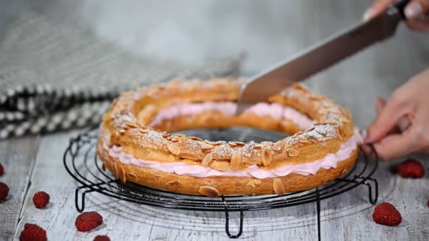 Homemade choux pastry cake Paris Brest with raspberries. French dessert. — Stock Video